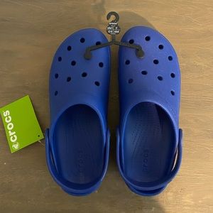 BRAND NEW size men’s 9, women’s 11 royal blue CROCS!